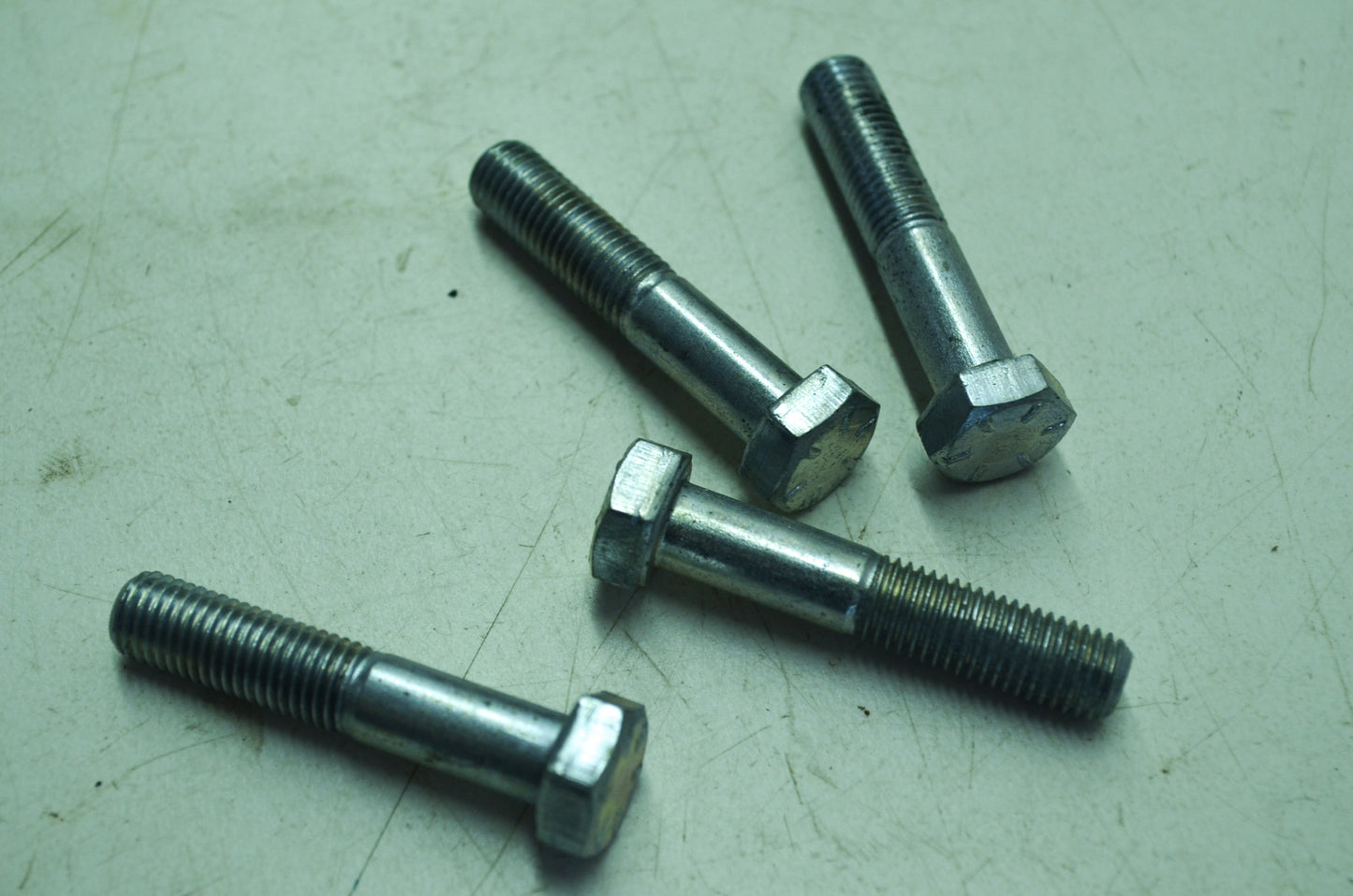 OEM Harley-Davidson 4041W Carrier Bolt Qty 4 NOS