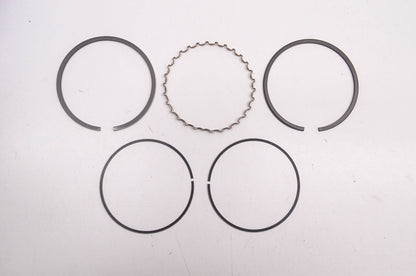 New OEM Kawasaki 13025-2071 Piston Ring Kit .25mm NOS