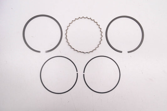 New OEM Kawasaki 13025-2071 Piston Ring Kit .25mm NOS