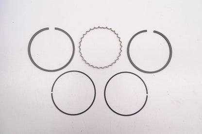 New OEM Kawasaki 13025-2071 Piston Ring Kit .25mm NOS