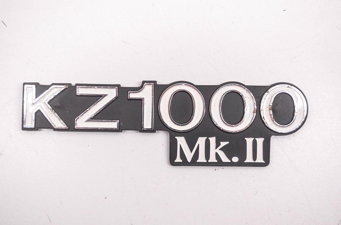 New OEM Kawasaki 56018-1115 KZ1000 MK II Side Cover Emblem NOS