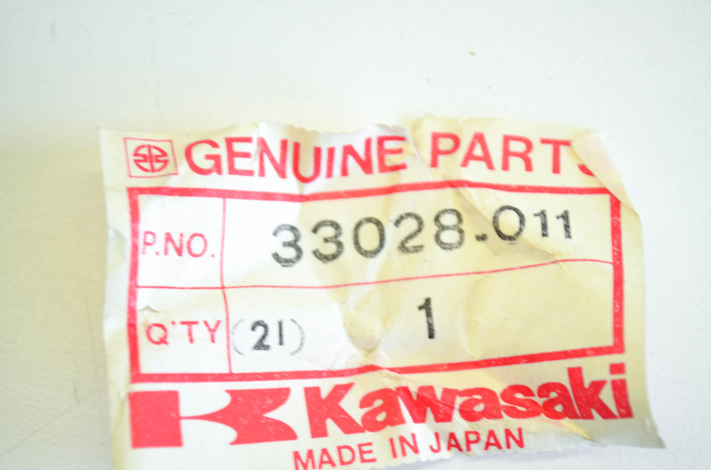 New OEM Kawasaki 33028-011 Rear Footrest Bracket NOS
