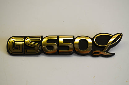 New OEM Suzuki 68131-34410 Side Cover Emblem NOS
