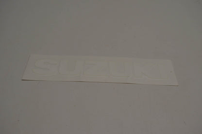 New OEM Suzuki 68111-40B01-064 Emblem White NOS