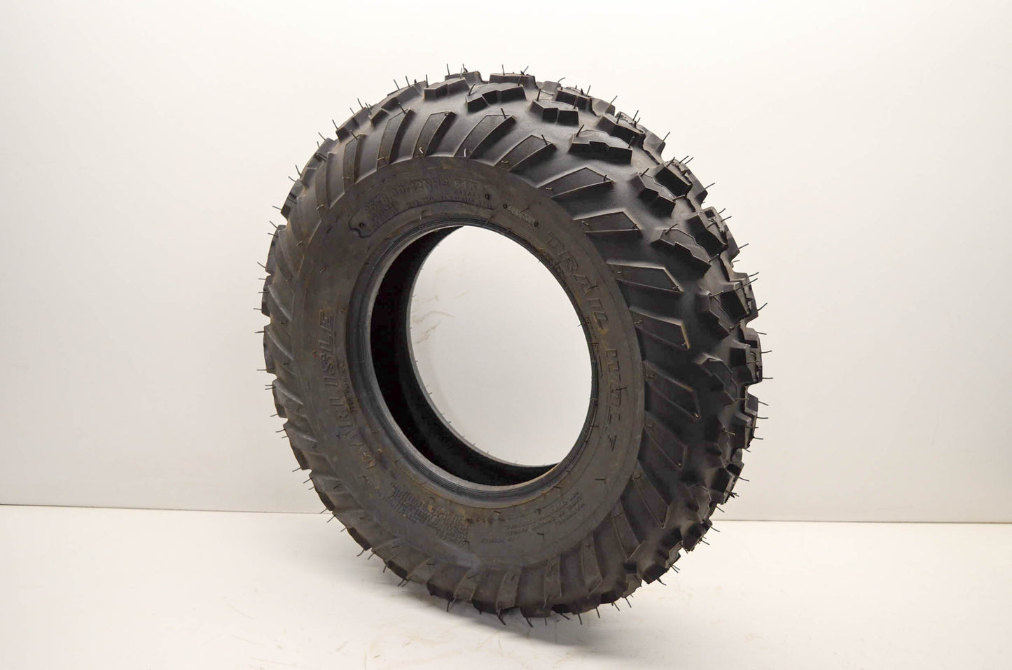 Carlisle 537062, 25x8.00-12NHS 61K Front Tire Trail Wolf 25x8.00-12NHS 61K NOS