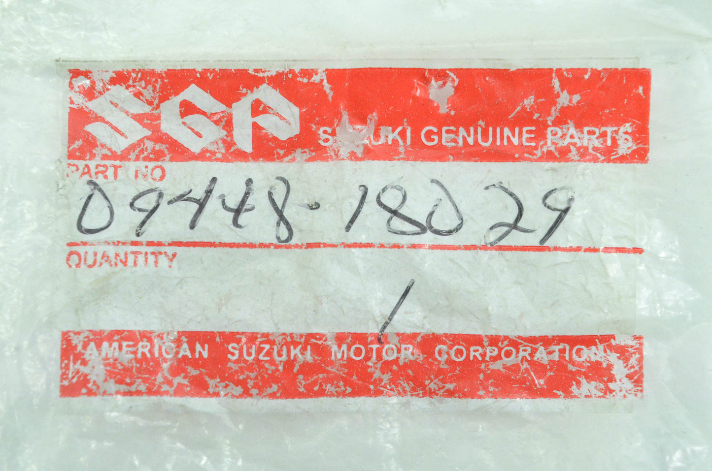 New OEM Suzuki 09448-18029 Footrest Spring NOS