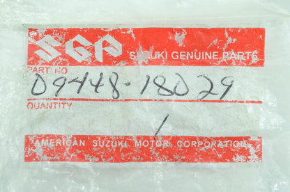 New OEM Suzuki 09448-18029 Footrest Spring NOS