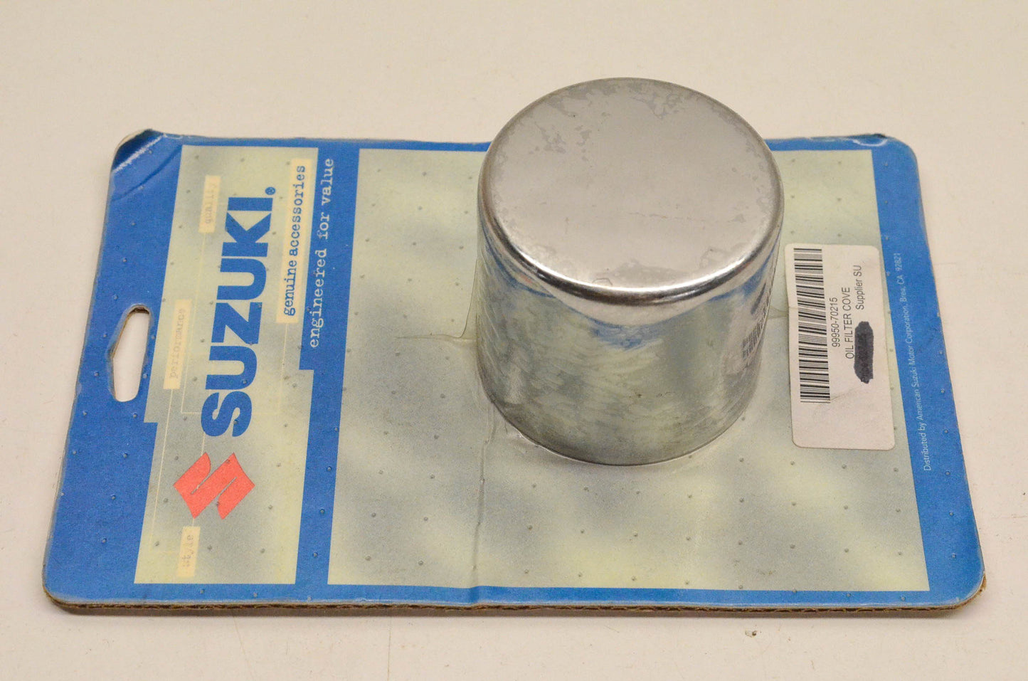 New OEM Suzuki 99950-70215 Oil Filter Cover NOS