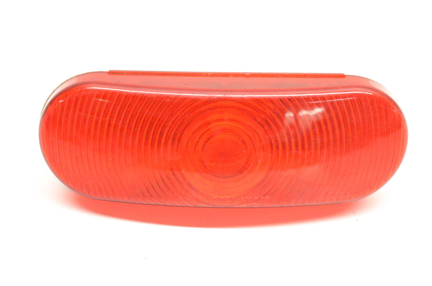 Aftermarket SAE STIPP2 03 DOT Red Oval Lens
