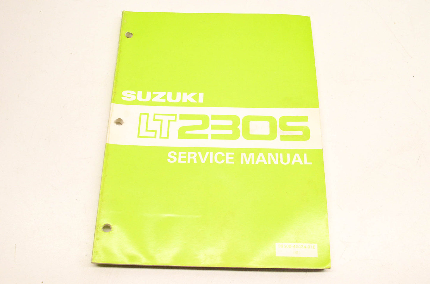 New OEM Suzuki 99500-42034-01E LT230S Service Manual NOS