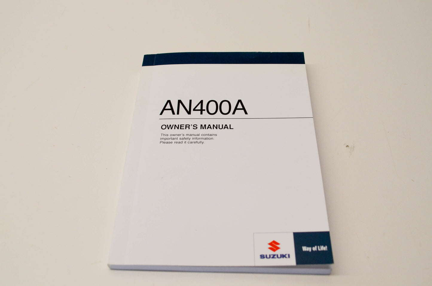 New OEM Suzuki 99011-05H75-03A AN400A Owner's Manual NOS