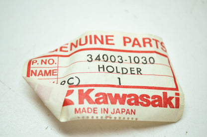 OEM Kawasaki 34003-1030 Right Hand Footrest Holder NOS